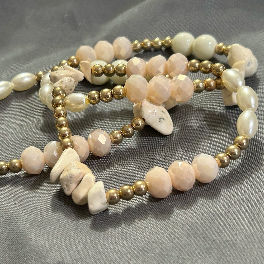 Set of Three Stretchy Bracelets Gold Pink and Natural